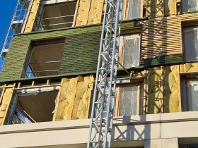 Travaux tuiles et façades Village Olympique — chantier